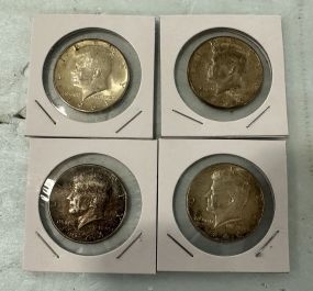 Four 1967 Kennedy Half Dollars