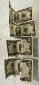 Four Two Dollar Notes