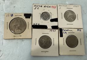 Costa Rica 5 Cent, Panama 1947, Canadian 5 Cent, 1973 Canadian 25 Cent and 1970 Bermuda 50 Cent