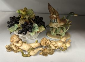 Resin Cherub, Porcelain Flower Basket, and Duck