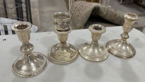 Four Weighted Sterling Candle Holders