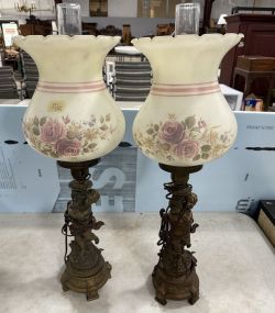 Pair of Vintage Metal Figural Globe Lamps