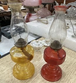 Two Amber and Red Vintage Glass Oil Lamps