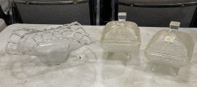 Two Covered Candy Dishes and Glass Basket