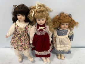 Three Porcelain Girl Dolls
