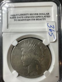 1935-S Peace Dollar Wear Date Encapsulated  4 Rays Rare