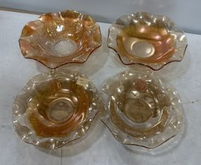 Four of Marigold Carnival Glass Bowls