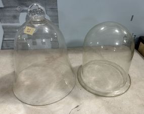 Two Large Glass Domes