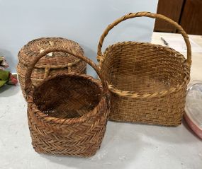 Three Woven Decorative Baskets