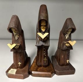 Three Wood Carved Priest Sculptures
