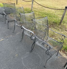 Four Wrought Iron Patio Arm Chairs