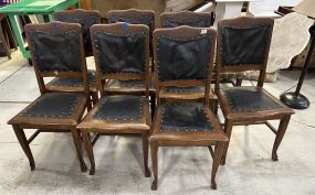 7 Antique Oak Carved Paw Footed Dining Chairs