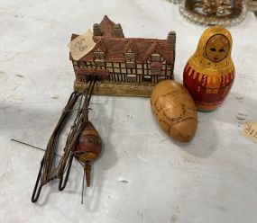 Old Fishing Line, Russian Nesting Dolls, and Castle Figurine