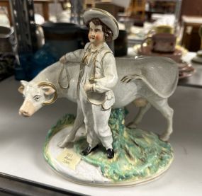 Antique Crackle Man and Cow Figurine