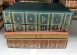 Four Gold Leather Bound Books