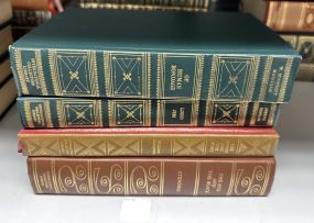 Four Gold Leather Bound Books