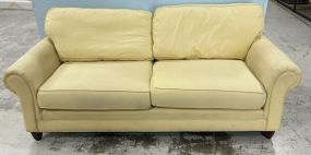 7' Yellow Upholstered Two Cushion Sofa