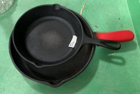 Two Cast Iron Skillets