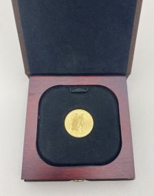 $100 Gold Proof Olympic Coin