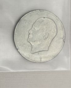 One 197-D Eisenhower Dollar