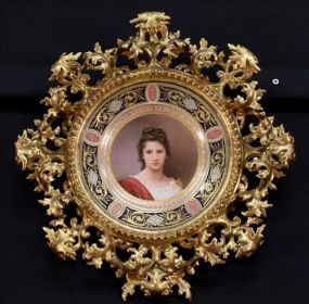Pair Royal Vienna collectors plates in gold frames
