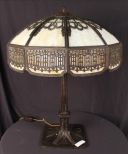 Bronze lamp with slag glass shade, 31 in. T.