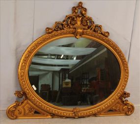 Oval gold Victorian over the mantle mirror