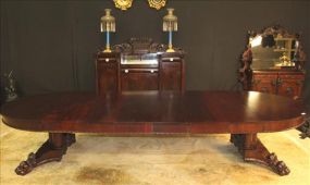 Mahogany Empire dining table with claw feet