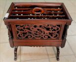 Walnut Victorian carved canterbury by Roux