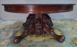 Solid mahogany center table, heavily carved