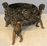 Bronze planter with cupid fugural supports