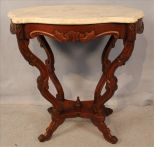 Small walnut Victorian turtle top lamp table