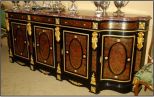 Long decorated mahogany sideboard with mirror