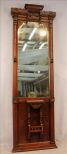 Walnut Eastlake pier mirror, 88 in. T, 28 in. W.