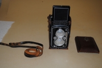 ROLLEIFLEX CAMERA; in leather carrying case