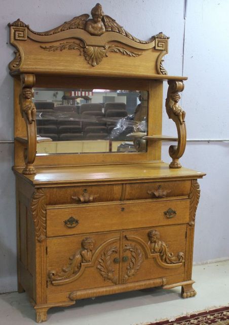 Oak Clawfoot Heavily Carved Cupid Sideboard