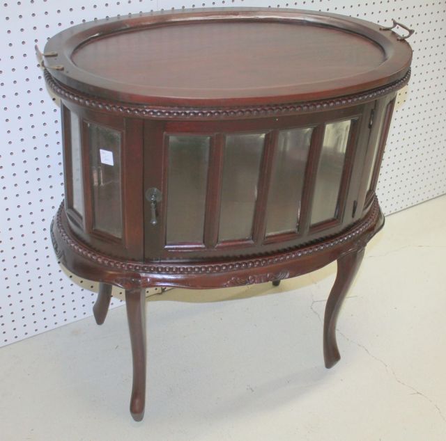 Oval Chocolate Cabinet