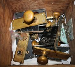 Box Group of Various Antique Brass Door Plates, Knobs, and Hardware