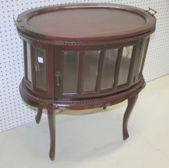Oval Chocolate Cabinet