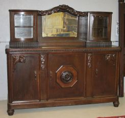 Large Oak Two Piece Sideboard with Mirrored Back, Two Curved Glass Curio Cases, and Pull Out Serving Board