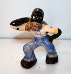 Shearwater Pottery Figurine of Black American Carrying Sack