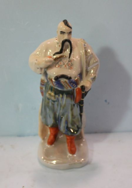 Lusterware Figurine of Warrior with Pipe