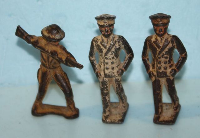 Three Cast Iron Vintage Small Men