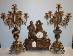 Pair of Ornate Brass Seven Arm Candelabras along with 20th Century Brass Statue Clock