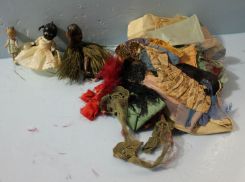 Three Mini Dolls and Assortment of Doll Clothes