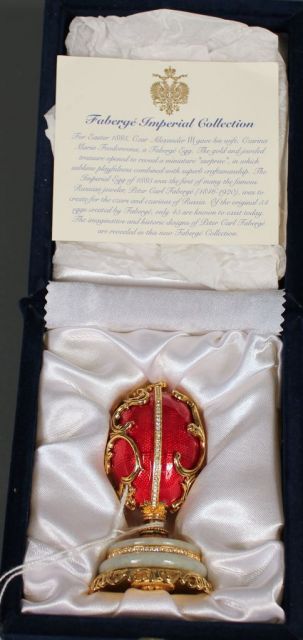 Red Enamel Egg Which Opens and Contains Basket of Flowers From Faberge Imperial Collection