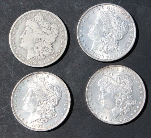 Four Morgan Silver Dollars