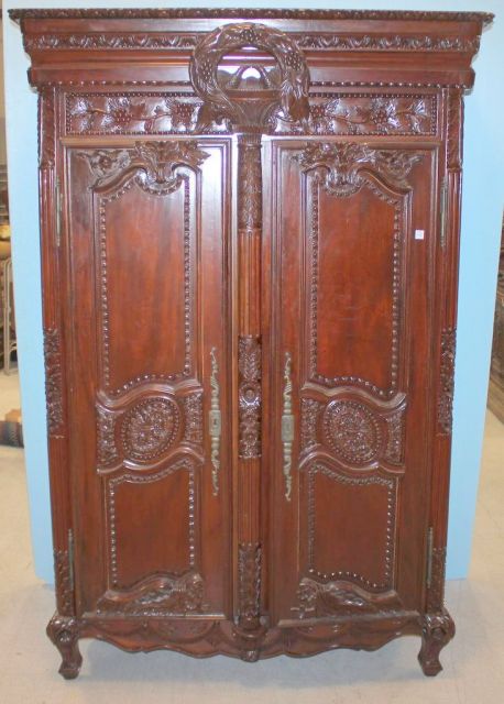 Elaborately Carved Armoire