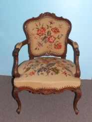 Carved Walnut French Arm Chair