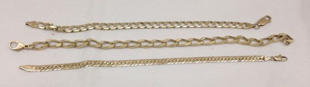 Three stamped 14KT yellow gold lady's bracelets